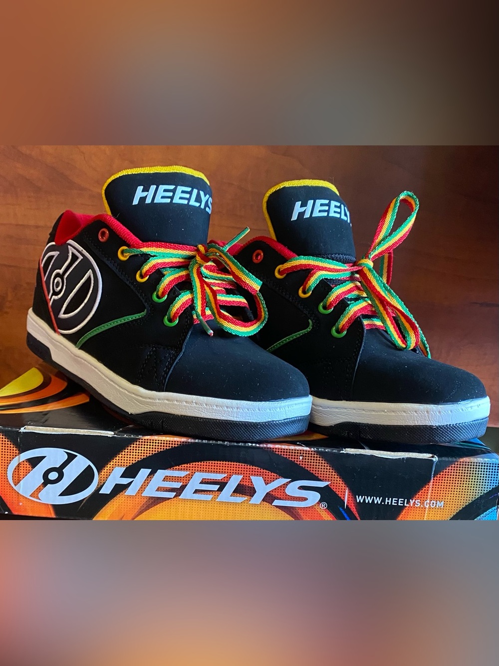Heelys Youth Size 6 Black Sneakers with Red, Yellow & Green Accents / Laces.